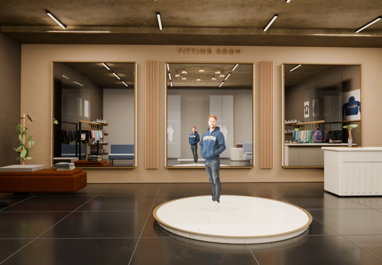 Fitting Room showroom from the doors: a shopper on the marble stage in front of three brass-framed mirrors