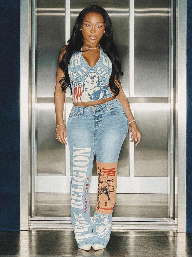 becca mid rise print flap bootcut jean